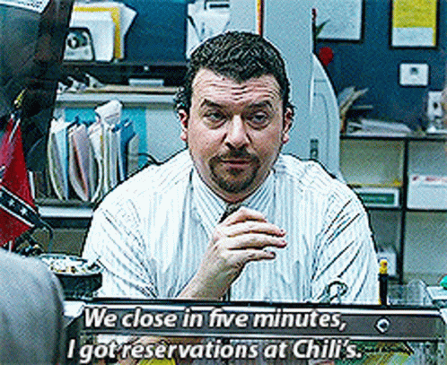 Man at Desk We Close in Five Minutes