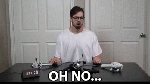 Man at Desk With Clock Saying Oh No