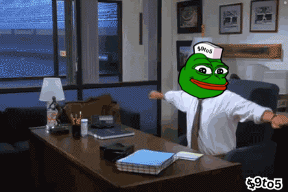 Man at Desk With Hat Saying $ 9to5