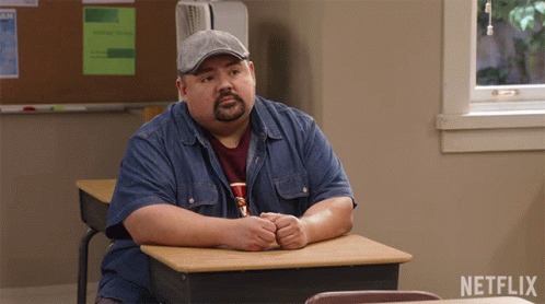 Man at Desk With Netflix Logo