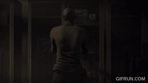 Man At Locker With Gifrun.com Logo GIF