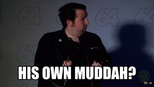 Man at Microphone His Own Muddah