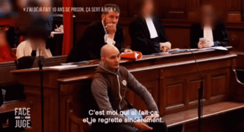 Man at Microphone in Courtroom with Face Juge