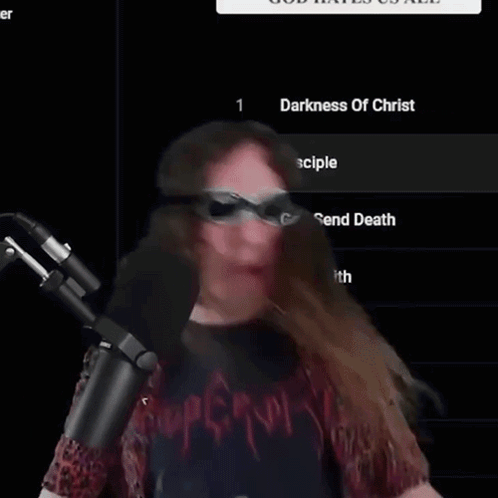 Man at Microphone Saying Darkness of Christ