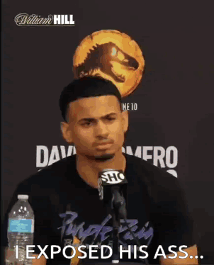 Man at Microphone Saying I Exposed His Ass
