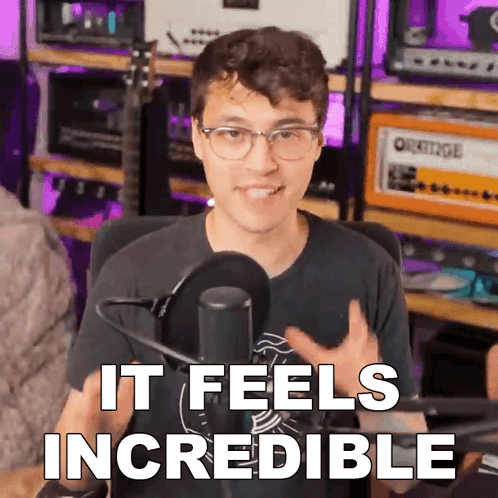 Man at Microphone Saying It Feels Incredible
