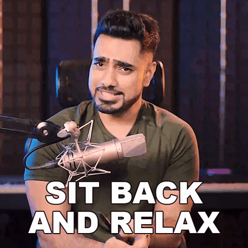 Man at Microphone Saying Sit Back and Relax