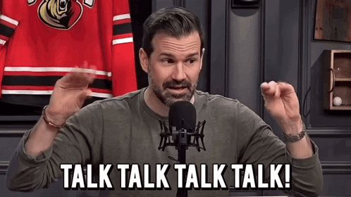 Man at Microphone Saying Talk