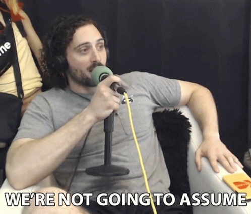 Man At Microphone Saying We're Not Going To Assume GIF