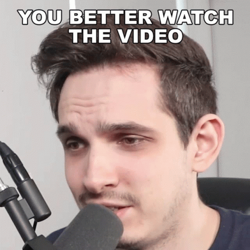 Man at Microphone Saying You Better Watch the Video