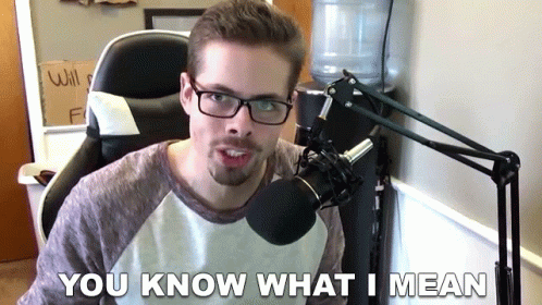 Man at Microphone With You Know What I Mean