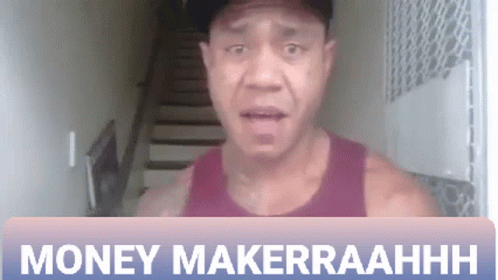 Man at Money Makerrraahhh Sign