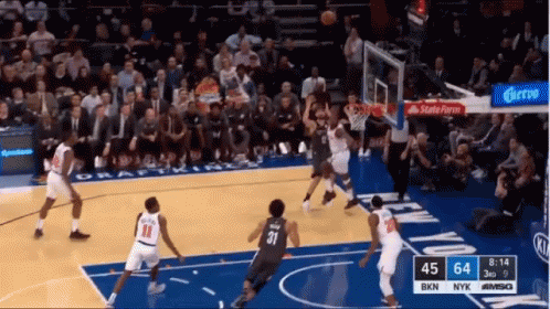 Man At Podium With AA Sign GIF