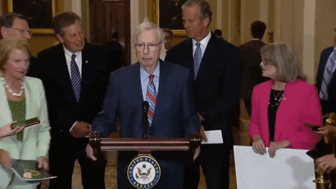 Man at Podium With United States of America Seal