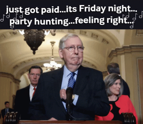 Man at Podium With Words Just Got Paid Its Friday Night Party Hunting Feeling Right Behind
