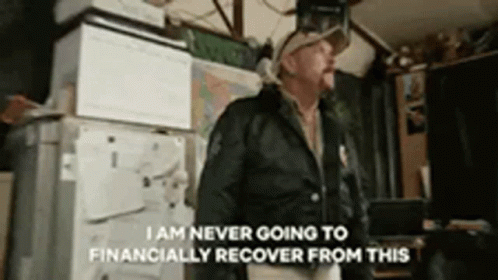 Man at Refrigerator I Am Never Going to Financially Recover From This