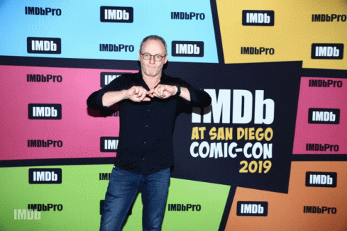 Man at San Diego Comic Con with IMDb Wall