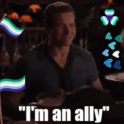 Man at Table Saying I'm an Ally