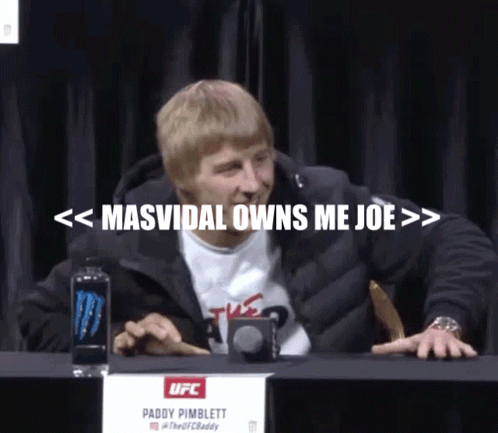 Man at Table with Masvidal Owns Me Joe