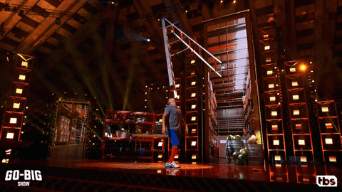 Man Balance Ladder On His Chin GIF