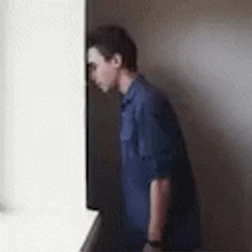 Man Banging Head On Wall Edit GIF