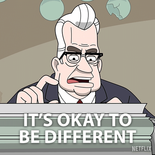 Man Behind It's Okay to Be Different Sign