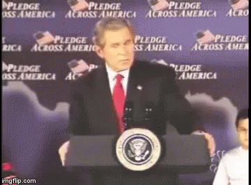 Man Behind Pledge America Podium