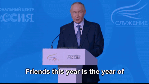 Man Behind Podium Saying Friends This Year Is the Year Of