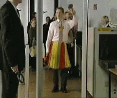 Man Belly Dance Inside Airport GIF