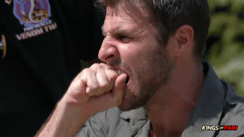 Man Biting Nails in Fire Rescue Shirt