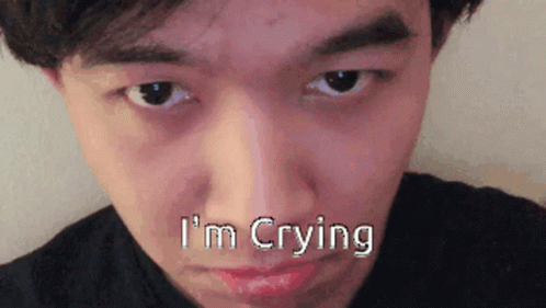 Man Blinking Hard For Fake Cry GIF