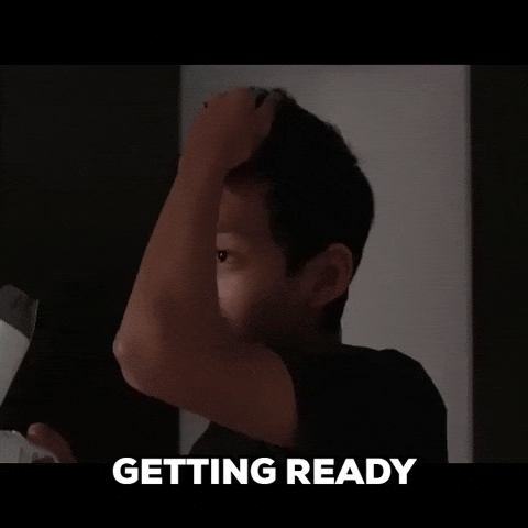 Man Blowing Dry His Hair Getting Ready GIF