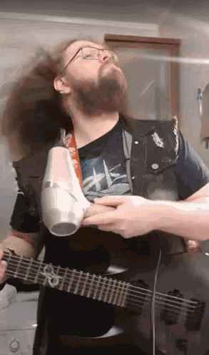 Man Blowing Long Hair Fabio Lanzoni Parody GIF
