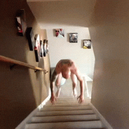Man Boing Like Frog Up Stairs GIF