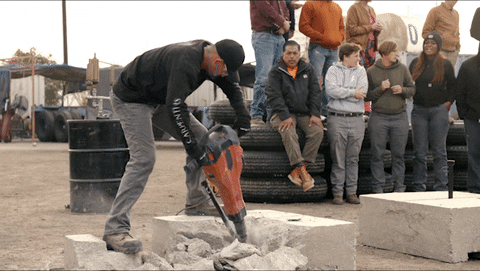Man Breaking Cement With A Jackhammer GIF