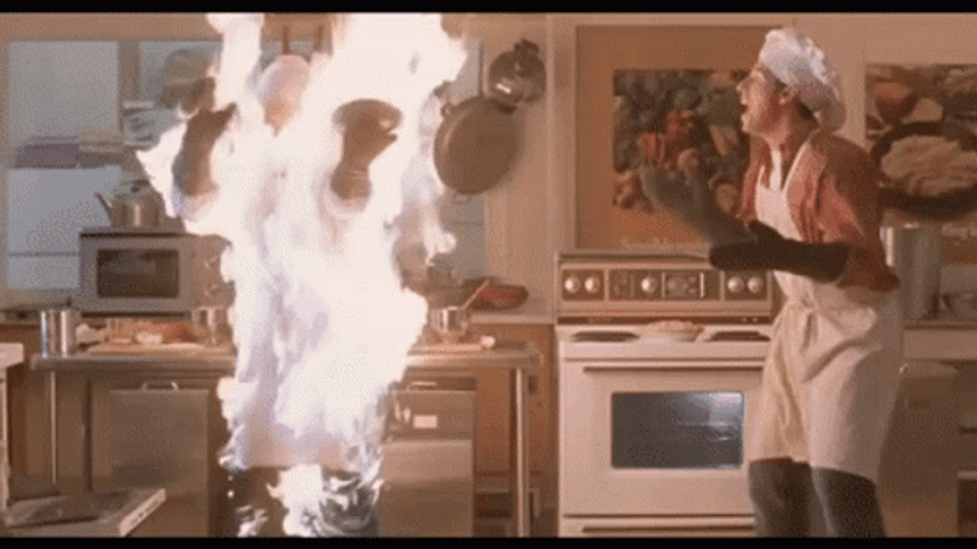 Man Burning In Kitchen Hair On Fire GIF
