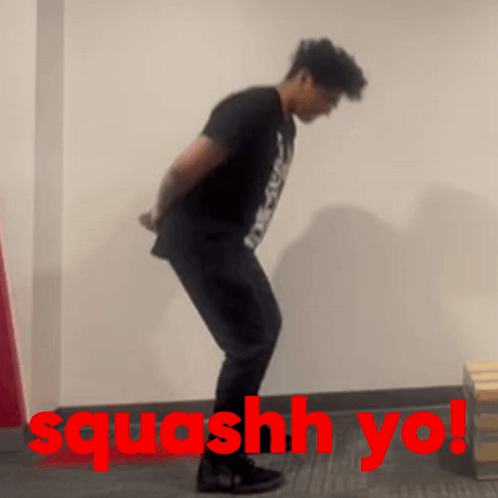 Man by Wall With Red Squash Yo