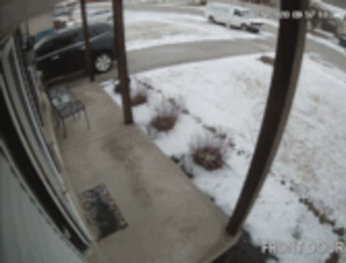 Man Carrying Lot Of Things Slipping On Ice GIF