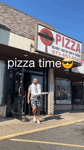 Man Carrying Pizza Box Walks Into Pizza Terminal