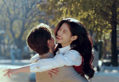 Man Carrying Woman On Back Hugging GIF