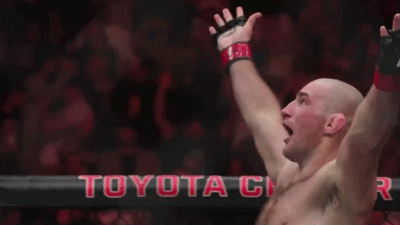 Man Celebrating in Boxing Ring