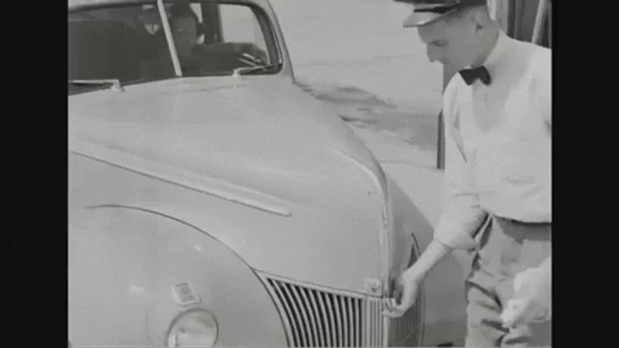 Man Checking Oil During 40s GIF