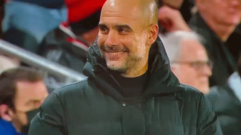 Man City Coach Pep Guardiola Tongue Out Wink GIF