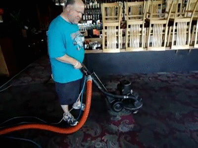 Man Cleaning The Cement Floor GIF