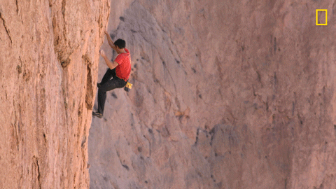 Man Climbing Mountain Alone GIF