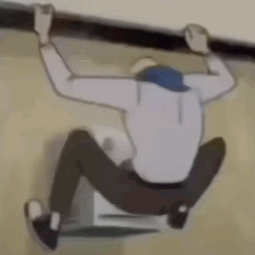 Man Climbing Wall With Hands Up