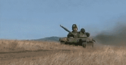 Man Controlling Tank GIF