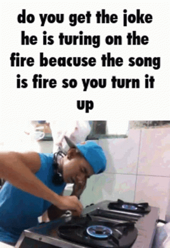 Man Cooking on Stove Talking on Phone
