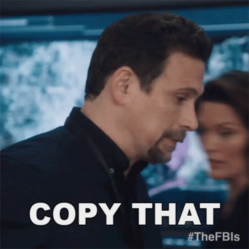 Man Copying Sign with Woman