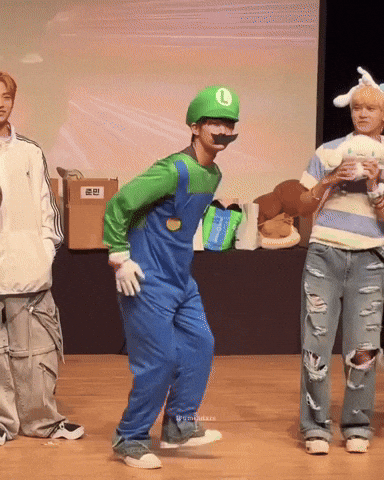 Man Cost Play Dancing Luigi Jumps Feet Spread GIF
